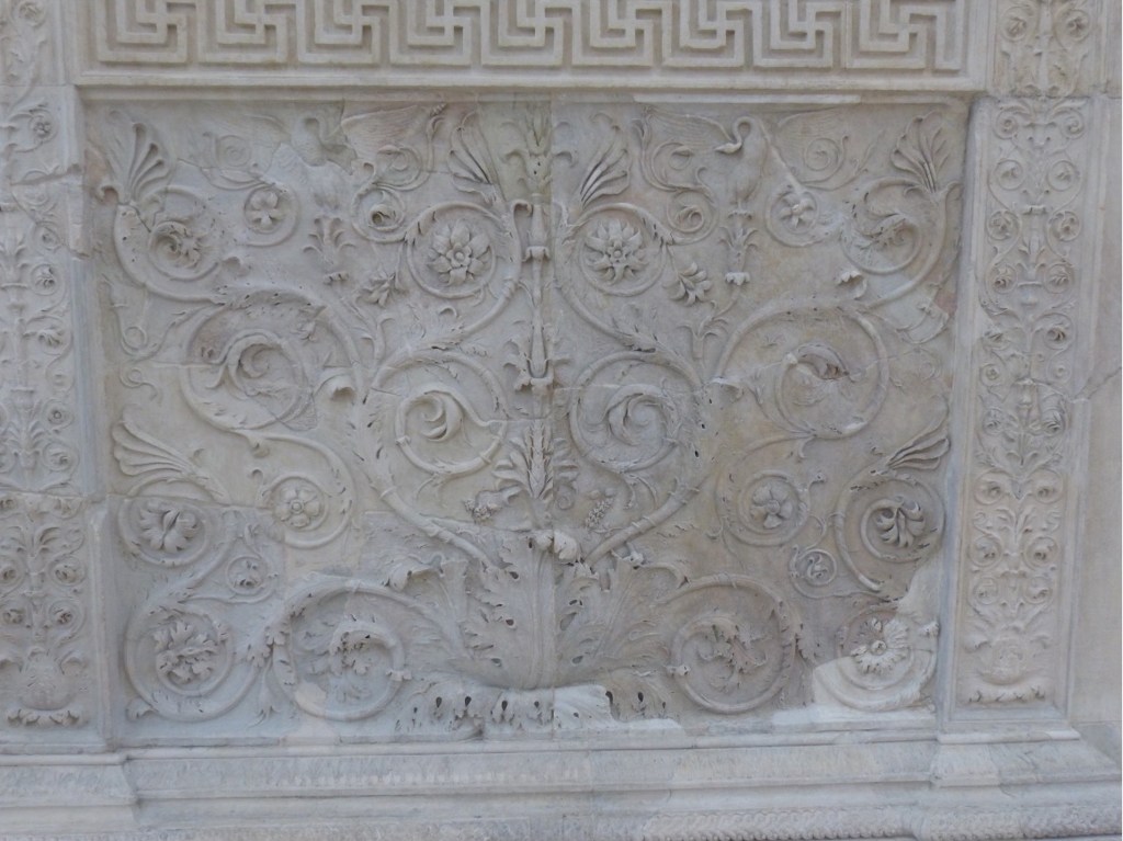 One of the acanthus friezes up close. The foliage grows out from an acanthus base and as the tendrils progress they seem to change into different plants. At the top of the frieze you might even spot two swans on either side of the main stem. Thanks to Dr Victoria Austen for this photo.