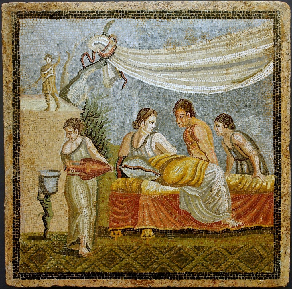 A coloured mosaic depicting two lovers together surrounded by attendants (likely slaves). One pour liquid from a vessel; one attends beside the bed.