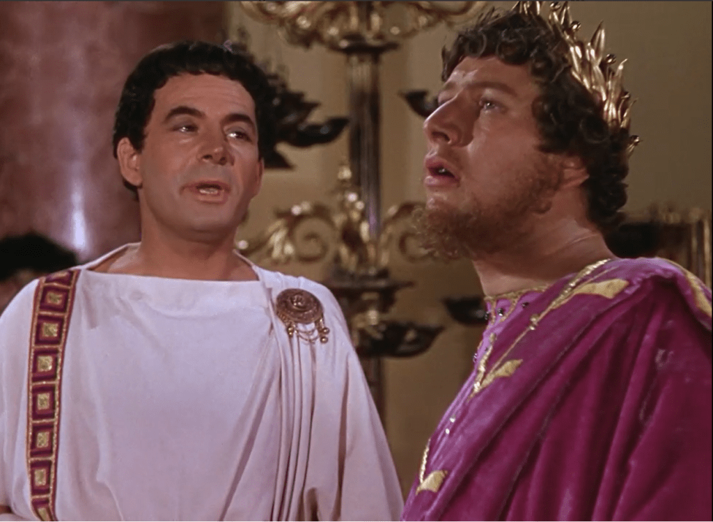Petronius attempting to advise Nero in a scene from Quo Vadis.